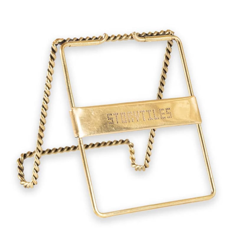 Achterkant goude tegelhouder