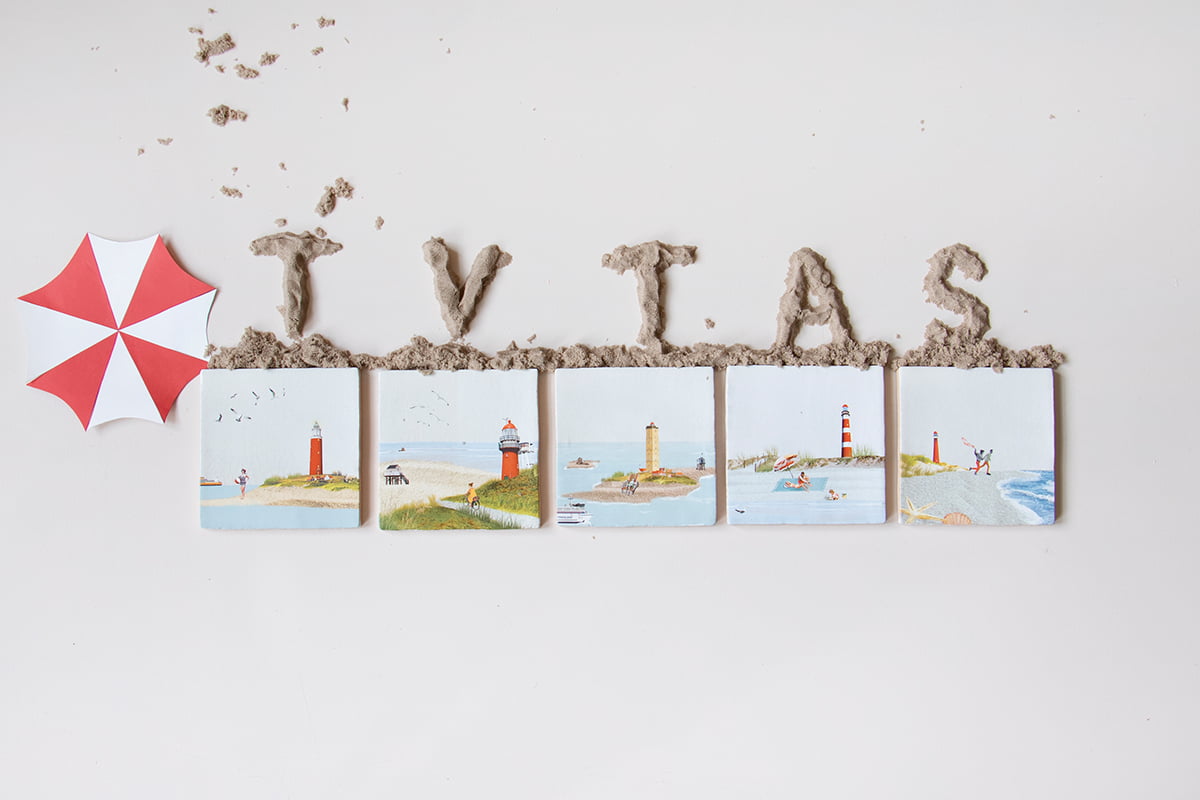 Tegeltjes Texel met vuurtorens en strand paraplu kunstzand